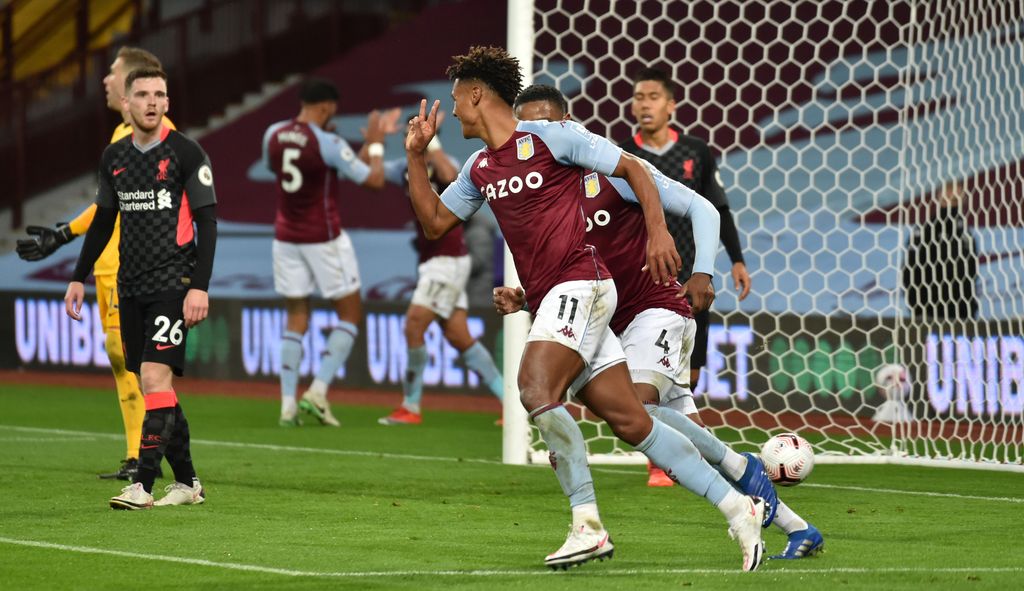 BIRMINGHAM, ENGLAND - OCTOBER 04: Ollie Watkins of Aston Villa  celebrates after he scores his team's fourth goal and his hat-rick  during the Premier League match between Aston Villa and Liverpool at Villa Park on October 04, 2020 in Birmingham, England. Sporting stadiums around the UK remain under strict restrictions due to the Coronavirus Pandemic as Government social distancing laws prohibit fans inside venues resulting in games being played behind closed doors. (Photo by Rui Vieira - Pool/Getty Images)