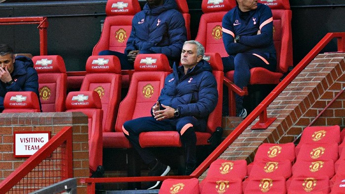 MANCHESTER, ENGLAND - OCTOBER 04: Jose Mourinho, Manager of Tottenham Hotspur looks on from the bench during the Premier League match between Manchester United and Tottenham Hotspur at Old Trafford on October 04, 2020 in Manchester, England. Sporting stadiums around the UK remain under strict restrictions due to the Coronavirus Pandemic as Government social distancing laws prohibit fans inside venues resulting in games being played behind closed doors. (Photo by Oli Scarff - Pool/Getty Images)