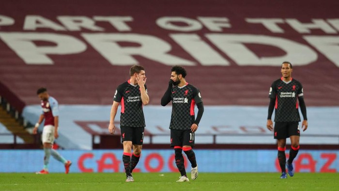 BIRMINGHAM, ENGLAND - OCTOBER 04: James Milner of Liverpool  speaks with Mohamed Salah of Liverpool after Aston Villa score their 7th goal during the Premier League match between Aston Villa and Liverpool at Villa Park on October 04, 2020 in Birmingham, England. Sporting stadiums around the UK remain under strict restrictions due to the Coronavirus Pandemic as Government social distancing laws prohibit fans inside venues resulting in games being played behind closed doors. (Photo by Catherine Ivill/Getty Images)