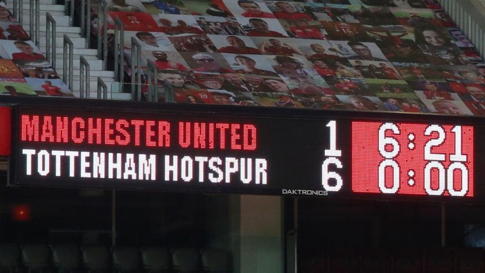MANCHESTER, ENGLAND - OCTOBER 04: A scoreboard is seen during the Premier League match between Manchester United and Tottenham Hotspur at Old Trafford on October 04, 2020 in Manchester, England. Sporting stadiums around the UK remain under strict restrictions due to the Coronavirus Pandemic as Government social distancing laws prohibit fans inside venues resulting in games being played behind closed doors. (Photo by Alex Livesey/Getty Images)