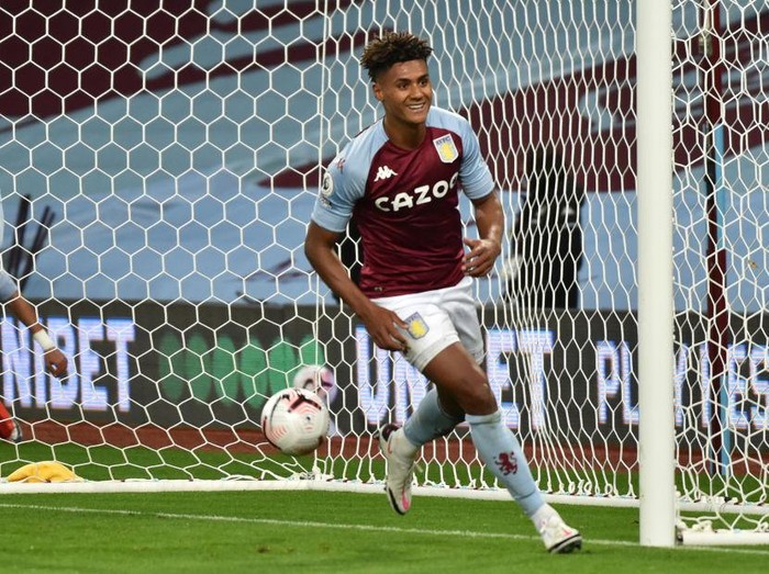 BIRMINGHAM, ENGLAND - OCTOBER 04: Ollie Watkins of Aston Villa  celebrates after he scores his team's fourth goal and his hat-rick  during the Premier League match between Aston Villa and Liverpool at Villa Park on October 04, 2020 in Birmingham, England. Sporting stadiums around the UK remain under strict restrictions due to the Coronavirus Pandemic as Government social distancing laws prohibit fans inside venues resulting in games being played behind closed doors. (Photo by Rui Vieira - Pool/Getty Images)
