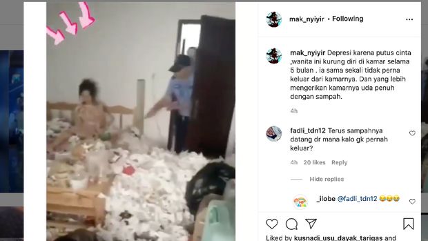 Viral wanita hidup dengan sampah.