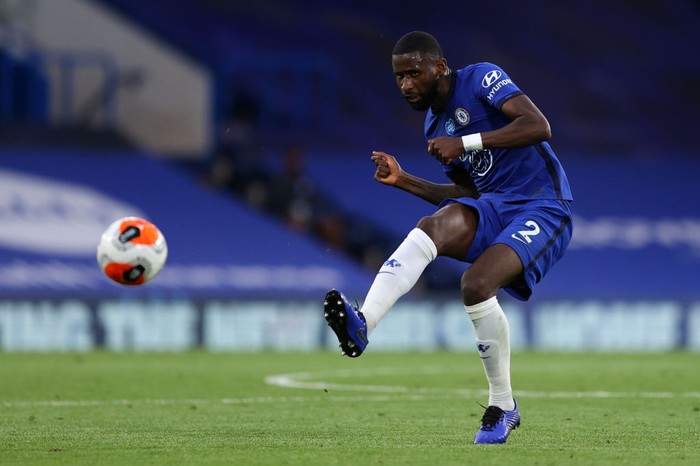 LONDON, ENGLAND - JULY 14: Antonio Rudiger of Chelsea on the ball during the Premier League match between Chelsea FC and Norwich City at Stamford Bridge on July 14, 2020 in London, England. Football Stadiums around Europe remain empty due to the Coronavirus Pandemic as Government social distancing laws prohibit fans inside venues resulting in all fixtures being played behind closed doors. (Photo by Richard Heathcote/Getty Images)