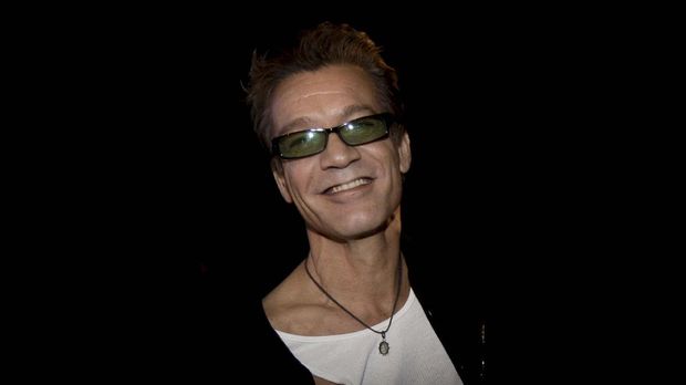 FILE -  Eddie Van Halen appears during a news conference in Los Angeles on Aug. 13, 2007. Van Halen, who had battled cancer, died Tuesday, Oct. 6, 2020. He was 65.  (AP Photo/Kevork Djansezian,Ffile)