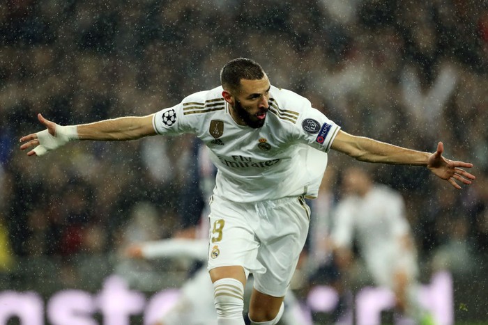 MADRID, SPAIN - NOVEMBER 26: Karim Benzema of Real Madrid celebrates after scoring his teams first goal during the UEFA Champions League group A match between Real Madrid and Paris Saint-Germain at Bernabeu on November 26, 2019 in Madrid, Spain. (Photo by Angel Martinez/Getty Images)