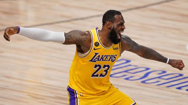 Los Angeles Lakers forward LeBron James celebrates during the second half in Game 4 of basketball's NBA Finals against the Miami Heat Tuesday, Oct. 6, 2020, in Lake Buena Vista, Fla. (AP Photo/Mark J. Terrill)