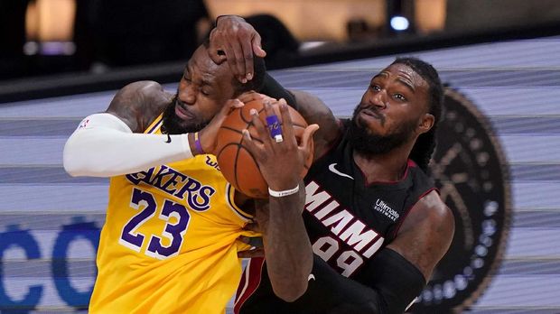 Los Angeles Lakers forward LeBron James and Miami Heat forward Jae Crowder battle for a rebound during the second half in Game 4 of basketball's NBA Finals Tuesday, Oct. 6, 2020, in Lake Buena Vista, Fla. (AP Photo/Mark J. Terrill)