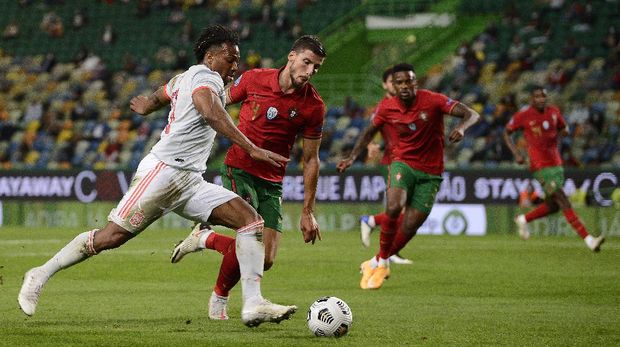 LISBON, PORTUGAL - OCTOBER 07: Adama Traore of Spain makes a run during the international friendly match between Portugal and Spain at Estadio Jose Alvalade on October 07, 2020 in Lisbon, Portugal. (Photo by Octavio Passos/Getty Images)