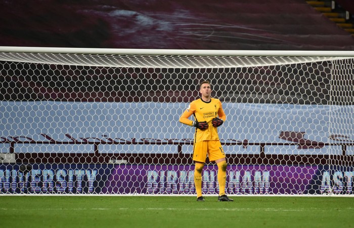 BIRMINGHAM, ENGLAND - OCTOBER 04: Adrian of Liverpool looks on during the Premier League match between Aston Villa and Liverpool at Villa Park on October 04, 2020 in Birmingham, England. Sporting stadiums around the UK remain under strict restrictions due to the Coronavirus Pandemic as Government social distancing laws prohibit fans inside venues resulting in games being played behind closed doors. (Photo by Rui Vieira - Pool/Getty Images)