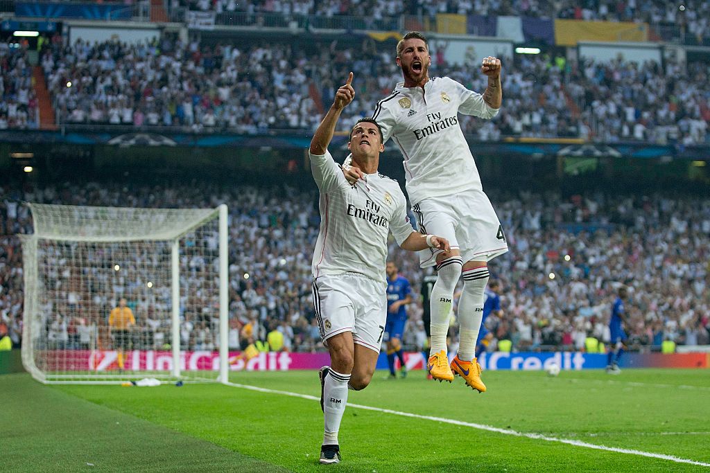 MADRID, SPAIN - MAY 13:  Cristiano Ronaldo (L) of Real Madrid CF celebrates scoring their opening goal with teammate Sergio Ramos (L) during the UEFA Champions League semi-final second leg match between Real Madrid CF and Juventus at Estadio Santiago Bernabeu on May 13, 2015 in Madrid, Spain.  (Photo by Gonzalo Arroyo Moreno/Getty Images)