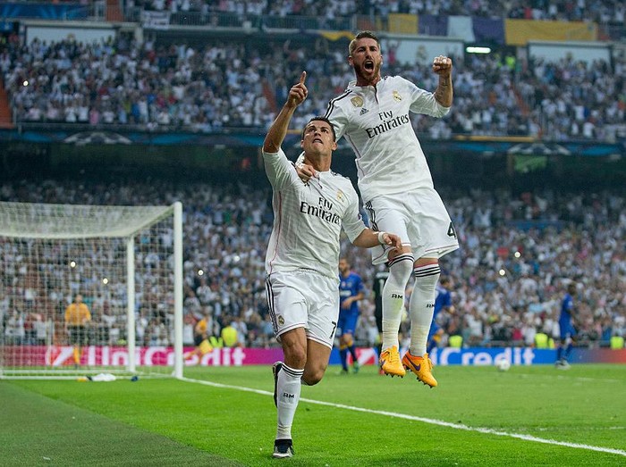 MADRID, SPAIN - MAY 13:  Cristiano Ronaldo (L) of Real Madrid CF celebrates scoring their opening goal with teammate Sergio Ramos (L) during the UEFA Champions League semi-final second leg match between Real Madrid CF and Juventus at Estadio Santiago Bernabeu on May 13, 2015 in Madrid, Spain.  (Photo by Gonzalo Arroyo Moreno/Getty Images)