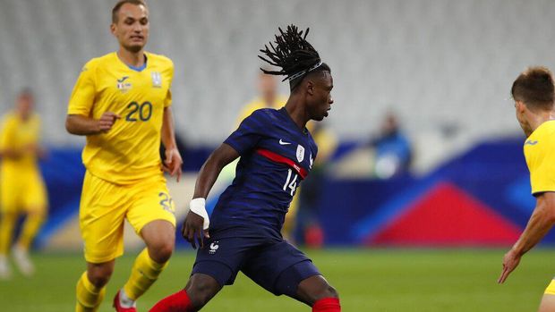 France's Eduardo Camavinga controls the ball during their friendly international soccer maths between France and Ukraine at the Stade deFrance in Saint Denis, north of Paris, Wednesday Oct. 7, 2020. (AP Photo/Francois Mori)