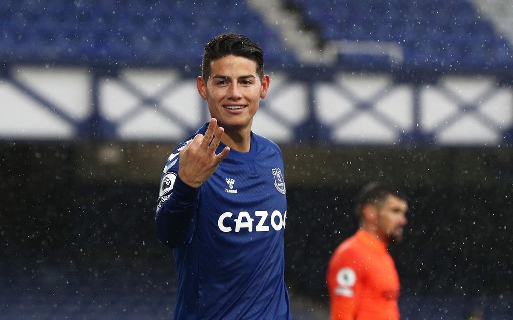 LIVERPOOL, ENGLAND - OCTOBER 03: James Rodriguez of Everton celebrates after scoring his team's fourth goal during the Premier League match between Everton and Brighton & Hove Albion at Goodison Park on October 03, 2020 in Liverpool, England. Sporting stadiums around the UK remain under strict restrictions due to the Coronavirus Pandemic as Government social distancing laws prohibit fans inside venues resulting in games being played behind closed doors. (Photo by Jan Kruger/Getty Images)