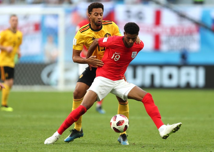 SAINT PETERSBURG, RUSSIA - JULY 14:  Marcus Rashford of England is challenged by Moussa Dembele of Belgium during the 2018 FIFA World Cup Russia 3rd Place Playoff match between Belgium and England at Saint Petersburg Stadium on July 14, 2018 in Saint Petersburg, Russia.  (Photo by Clive Rose/Getty Images)