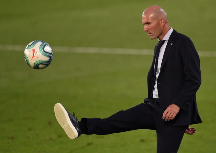 MADRID, SPAIN - JULY 16: Madrid coach Zinédine Zidane controls the ball during the Liga match between Real Madrid CF and Villarreal CF at Estadio Alfredo Di Stefano on July 16, 2020 in Madrid, Spain. (Photo by Denis Doyle/Getty Images)
