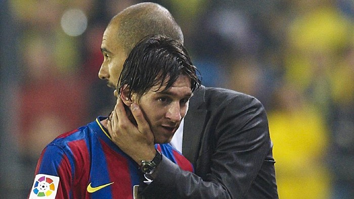 VILLARREAL, SPAIN - MAY 01:  Head coach Josep Guardiola (R) of FC Barcelona embraces Lionel Messi during the La Liga match between Villarreal CF and FC Barcelona at El Madrigal stadium on May 1, 2010 in Villarreal, Spain.  (Photo by Manuel Queimadelos Alonso/Getty Images)
