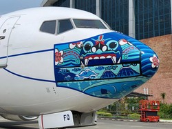 Pesawat Garuda Pakai Masker, Kali Ini Bermotif Barong Bali