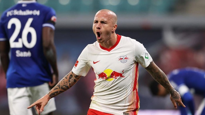 LEIPZIG, GERMANY - OCTOBER 03: Angelino of RB Leipzig celebrates after scoring his teams second goal during the Bundesliga match between RB Leipzig and FC Schalke 04 at Red Bull Arena on October 03, 2020 in Leipzig, Germany. 8,500 fans have been allowed in to the stadium as COVID-19 precautions ease in Germany. (Photo by Alexander Hassenstein/Getty Images)