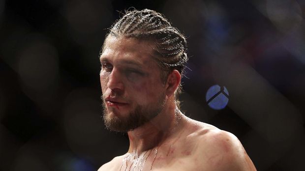 TORONTO, ON - DECEMBER 8: Brian Ortega of the United States leaves the octagon following his defeat to Max Holloway of the United States in a featherweight bout during the UFC 231 event at Scotiabank Arena on December 8, 2018 in Toronto, Canada.   Vaughn Ridley/Getty Images/AFP