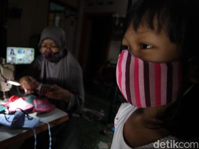 Geliat Masker Berbahan Kain Lurik