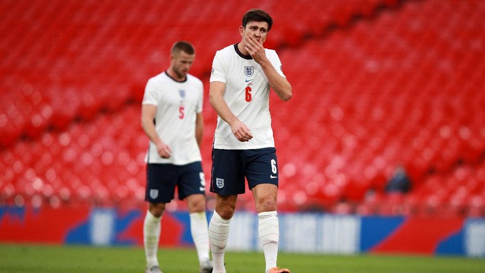 LONDON, ENGLAND - OCTOBER 11: Harry Maguire of England reacts during the UEFA Nations League group stage match between England and Belgium at Wembley Stadium on October 11, 2020 in London, England. Football Stadiums around Europe remain empty due to the Coronavirus Pandemic as Government social distancing laws prohibit fans inside venues resulting in fixtures being played behind closed doors. (Photo by Ian Walton - Pool/Getty Images)