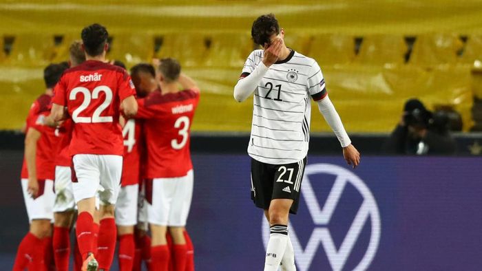 1280047436 COLOGNE, GERMANY - OCTOBER 13: Kai Havertz of Germany shows his disappointment after the third goal for Switzerland during the UEFA Nations League group stage match between Germany and Switzerland at RheinEnergieStadion on October 13, 2020 in Cologne, Germany. Football Stadiums around Europe remain empty due to the Coronavirus Pandemic as Government social distancing laws prohibit fans inside venues resulting in fixtures being played behind closed doors. (Photo by Martin Rose/Getty Images)