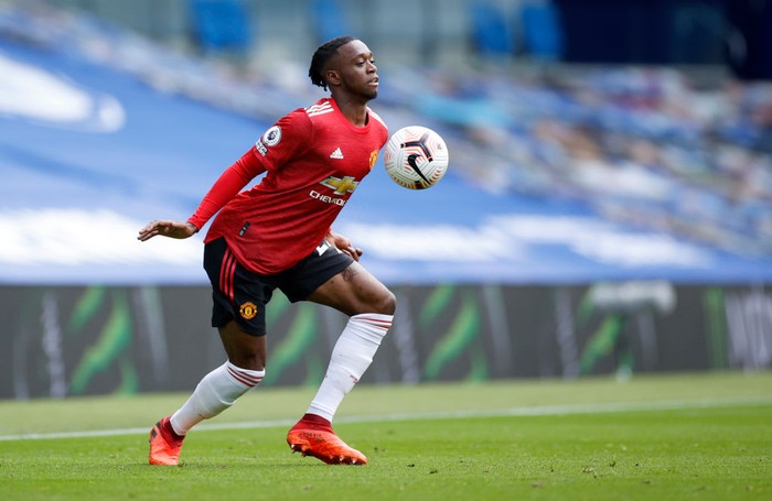 BRIGHTON, ENGLAND - SEPTEMBER 26: Aaron Wan-Bissaka of Manchester United controls the ball during the Premier League match between Brighton & Hove Albion and Manchester United at American Express Community Stadium on September 26, 2020 in Brighton, England. Sporting stadiums around the UK remain under strict restrictions due to the Coronavirus Pandemic as Government social distancing laws prohibit fans inside venues resulting in games being played behind closed doors. (Photo by John Sibley - Pool/Getty Images)