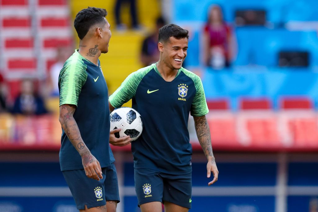 SAO PAULO, BRAZIL - OCTOBER 09: Philippe Coutinho of Brazil celebrates with Roberto Firmino after scoring the fifth goal during a match between Brazil and Bolivia as part of South American Qualifiers for Qatar 2022 at Neo Quimica Arena on October 09, 2020 in Sao Paulo, Brazil. (Photo by Buda Mendes/Getty Images)
