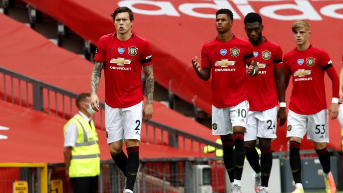 MANCHESTER, ENGLAND - JULY 22: Victor Lindelof of Manchester United walks onto the pitch prior to the Premier League match between Manchester United and West Ham United at Old Trafford on July 22, 2020 in Manchester, England. Football Stadiums around Europe remain empty due to the Coronavirus Pandemic as Government social distancing laws prohibit fans inside venues resulting in all fixtures being played behind closed doors. (Photo by Clive Brunskill/Getty Images)