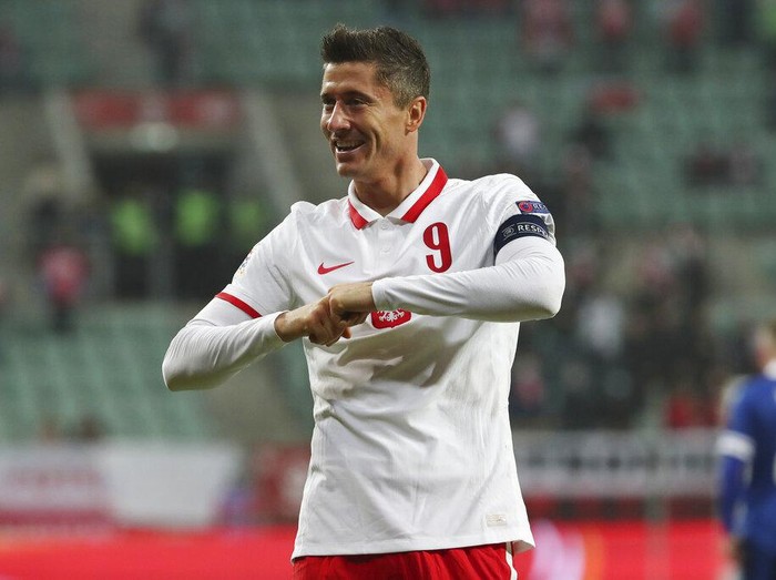 Poland's forward Robert Lewandowski celebrates after scoring a goal during a UEFA Nations League soccer match between Poland and Bosnia and Herzegovina in Wroclaw, Poland, Wednesday, Oct. 14, 2020.(AP Photo/Czarek Sokolowski)
