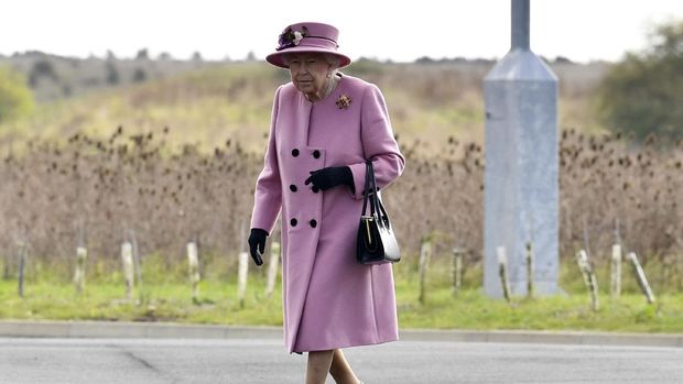 Britain's Queen Elizabeth II visits the Defence Science and Technology Laboratory (DSTL) at Porton Down, England, Thursday Oct. 15, 2020, to view the Energetics Enclosure and display of weaponry and tactics used in counter intelligence. (Ben Stansall/Pool via AP)