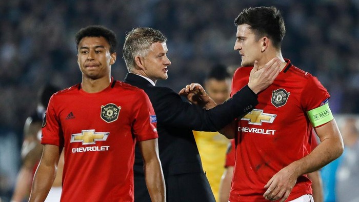 BELGRADE, SERBIA - OCTOBER 24: Manager Ole Gunnar Solskjaer (C) of Manchester United celebrate with Harry Maguire (R) and Jesse Lingard (L) after the UEFA Europa League group L match between Partizan and Manchester United at Partizan Stadium on October 24, 2019 in Belgrade, Serbia. (Photo by Srdjan Stevanovic/Getty Images)
