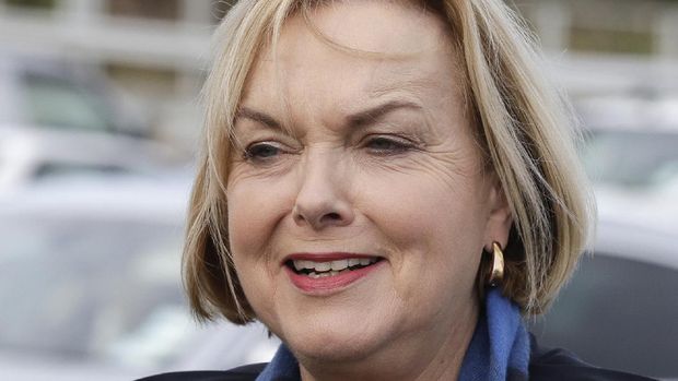 FILE - In this July 30, 2020, file photo, New Zealand opposition National Party leader Judith Collins arrives at a salmon factory in Christchurch, New Zealand. New Zealand has suffered a steep economic downturn due to the virus and is borrowing billions of dollars to try and stem job losses and rebuild. National is promising to increase infrastructure spending. (AP Photo/Mark Baker, File)
