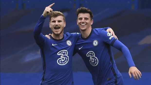 Chelsea's Timo Werner, left, celebrates after scoring his side's second goal during the English Premier League soccer match between Southampton and Chelsea at the Stamford Bridge in London, England, Saturday, Oct. 17, 2020.(Mike Hewitt/Pool via AP)