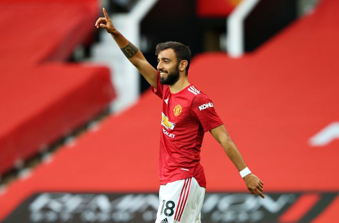 Bruno Fernandes MANCHESTER, ENGLAND - OCTOBER 04: Bruno Fernandes of Manchester United celebrates after scoring his sides first goal during the Premier League match between Manchester United and Tottenham Hotspur at Old Trafford on October 04, 2020 in Manchester, England. Sporting stadiums around the UK remain under strict restrictions due to the Coronavirus Pandemic as Government social distancing laws prohibit fans inside venues resulting in games being played behind closed doors. (Photo by Alex Livesey/Getty Images)