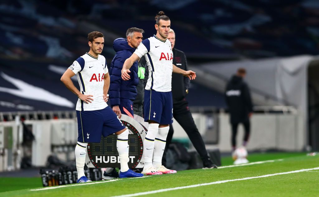LONDON, ENGLAND - OCTOBER 18: Heung-Min Son of Tottenham Hotspur celebrates after scoring his team's first goal during the Premier League match between Tottenham Hotspur and West Ham United at Tottenham Hotspur Stadium on October 18, 2020 in London, England. Sporting stadiums around the UK remain under strict restrictions due to the Coronavirus Pandemic as Government social distancing laws prohibit fans inside venues resulting in games being played behind closed doors. (Photo by Matt Dunham - Pool/Getty Images)