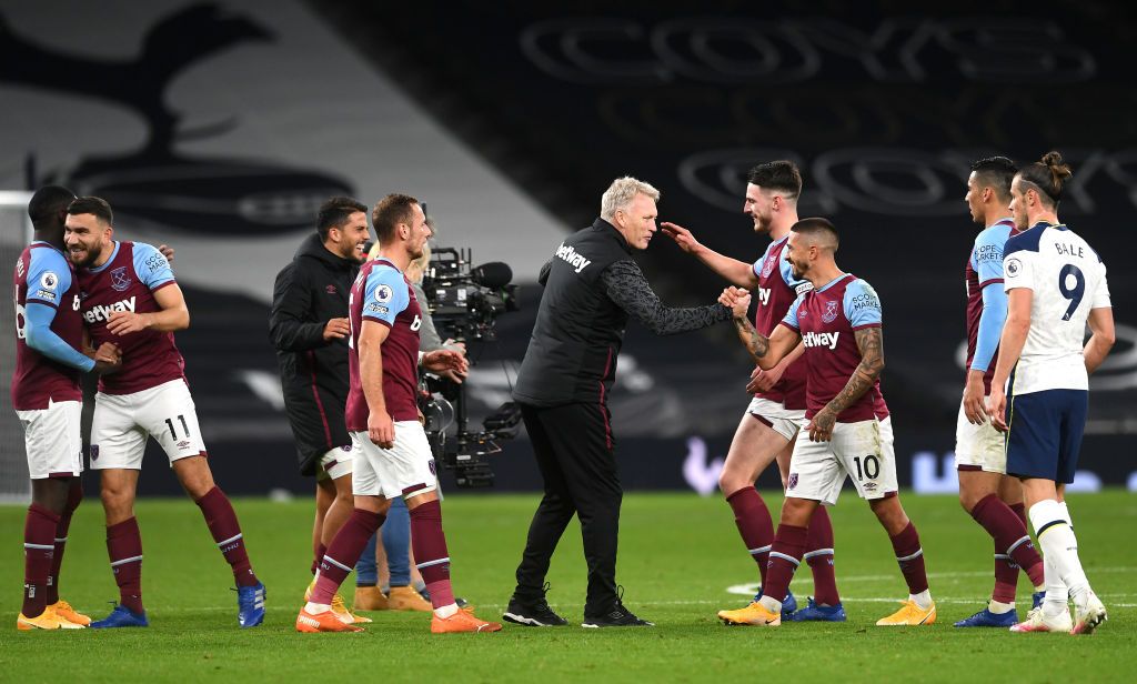 LONDON, ENGLAND - OCTOBER 18: Manuel Lanzini of West Ham United celebrates with teammates after scoring his team's third goal during the Premier League match between Tottenham Hotspur and West Ham United at Tottenham Hotspur Stadium on October 18, 2020 in London, England. Sporting stadiums around the UK remain under strict restrictions due to the Coronavirus Pandemic as Government social distancing laws prohibit fans inside venues resulting in games being played behind closed doors. (Photo by Matt Dunham - Pool/Getty Images)