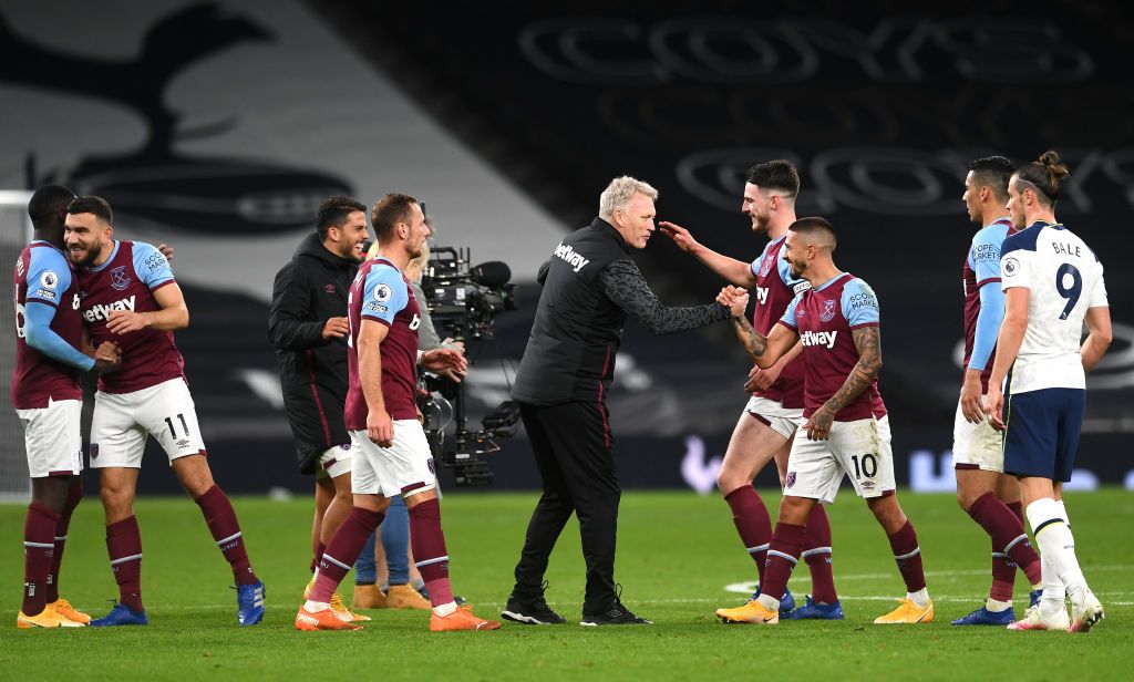 LONDON, ENGLAND - OCTOBER 18: Manuel Lanzini of West Ham United celebrates with teammates after scoring his team's third goal during the Premier League match between Tottenham Hotspur and West Ham United at Tottenham Hotspur Stadium on October 18, 2020 in London, England. Sporting stadiums around the UK remain under strict restrictions due to the Coronavirus Pandemic as Government social distancing laws prohibit fans inside venues resulting in games being played behind closed doors. (Photo by Matt Dunham - Pool/Getty Images)