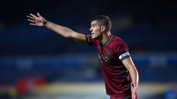 LEEDS, ENGLAND - OCTOBER 19: Conor Coady of Wolverhampton Wanderers reacts during the Premier League match between Leeds United and Wolverhampton Wanderers at Elland Road on October 19, 2020 in Leeds, England. Sporting stadiums around the UK remain under strict restrictions due to the Coronavirus Pandemic as Government social distancing laws prohibit fans inside venues resulting in games being played behind closed doors. (Photo by Michael Regan/Getty Images)