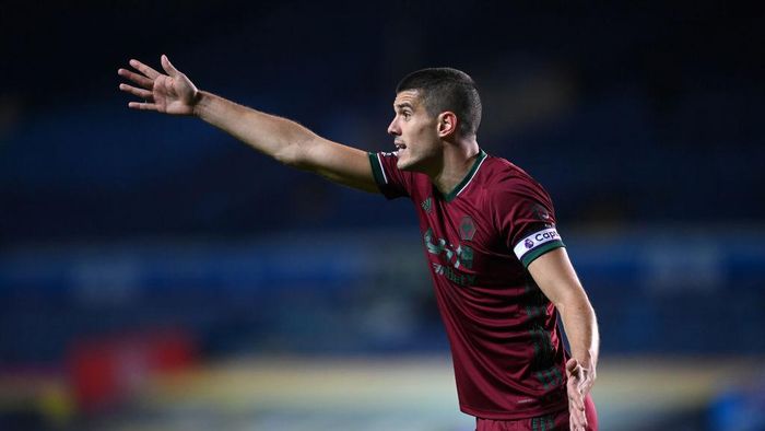 Conor Coady LEEDS, ENGLAND - OCTOBER 19: Conor Coady of Wolverhampton Wanderers reacts during the Premier League match between Leeds United and Wolverhampton Wanderers at Elland Road on October 19, 2020 in Leeds, England. Sporting stadiums around the UK remain under strict restrictions due to the Coronavirus Pandemic as Government social distancing laws prohibit fans inside venues resulting in games being played behind closed doors. (Photo by Michael Regan/Getty Images)