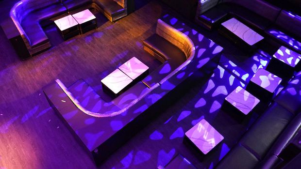 Lights shine on an empty LIV nightclub Wednesday, Oct. 14, 2020, in Miami Beach, Fla. LIV, one of Miami's most glamorous, star-studded nightclubs sits empty and quiet these days, a casualty of both the coronavirus outbreak and a power struggle between state and local government over how to contain the scourge. (AP Photo/Lynne Sladky)