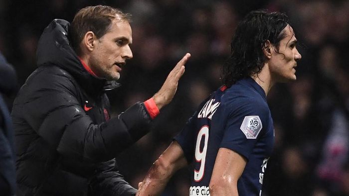 Tuchel Cavani Paris Saint-Germains German coach Thomas Tuchel (L) reacts with Paris Saint-Germains Uruguayan forward Edinson Cavani (R) during the French L1 football match between Paris Saint-Germain (PSG) and Girondins de Bordeaux at the Parc des Princes stadium in Paris, on February 23, 2020. (Photo by FRANCK FIFE / AFP)