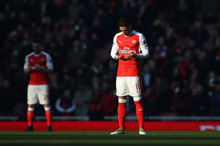 LONDON, ENGLAND - JANUARY 22: Mesut Ozil of Arsenal prays prior to the kick-off during the Premier League match between Arsenal and Burnley at the Emirates Stadium on January 22, 2017 in London, England.  (Photo by Julian Finney/Getty Images)