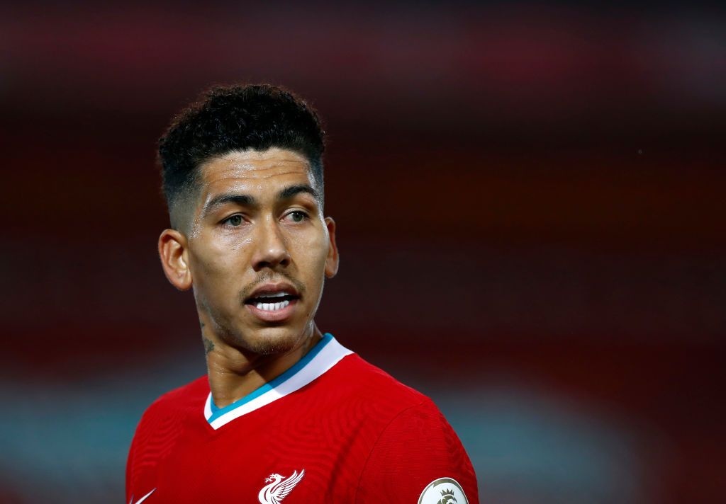 LIVERPOOL, ENGLAND - SEPTEMBER 28: Roberto Firminho of Liverpool reacts during the Premier League match between Liverpool and Arsenal at Anfield on September 28, 2020 in Liverpool, England. Sporting stadiums around the UK remain under strict restrictions due to the Coronavirus Pandemic as Government social distancing laws prohibit fans inside venues resulting in games being played behind closed doors. (Photo by Jason Cairnduff - Pool/Getty Images)
