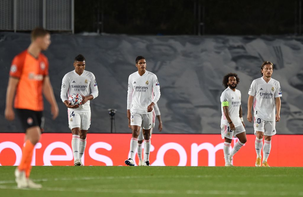 MADRID, SPAIN - OCTOBER 21: Marcelo, Raphael Varane, Luka Modric and Carlos Casimiro of Real Madrid look dejected after conceding a third goal during the UEFA Champions League Group B stage match between Real Madrid and Shakhtar Donetsk at Estadio Alfredo Di Stefano on October 21, 2020 in Madrid, Spain. The game will be played behind closed doors as a COVID-19 precaution. (Photo by Denis Doyle/Getty Images)