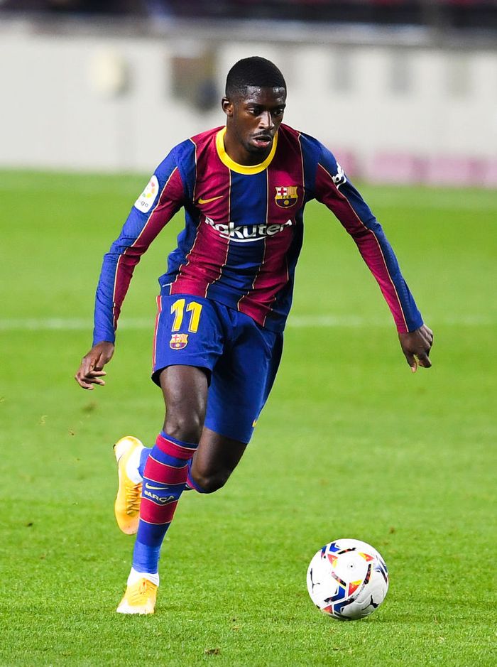 BARCELONA, SPAIN - OCTOBER 20: Ansu Fati of FC Barcelona runs with the ball during the UEFA Champions League Group G stage match between FC Barcelona and Ferencvaros Budapest at Camp Nou on October 20, 2020 in Barcelona, Spain. (Photo by Alex Caparros/Getty Images)