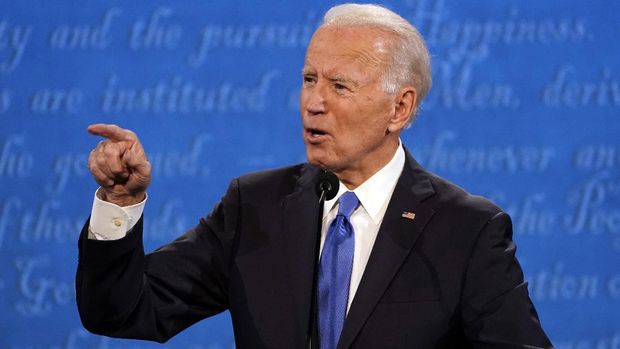 Democratic presidential candidate former Vice President Joe Biden speaks during the second and final presidential debate Thursday, Oct. 22, 2020, at Belmont University in Nashville, Tenn., with President Donald Trump. (AP Photo/Julio Cortez)