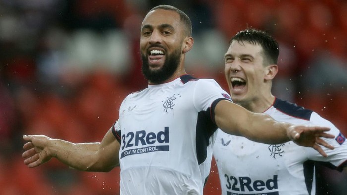 Rangers Kemar Roofe, left, jubilates with teammates after scoring his sides second goal during a Europa League Group D soccer match between Standard Liege and Rangers at the Maurice Dufrasne stadium in Liege, Belgium, Thursday, Oct. 22, 2020. (AP Photo/Francisco Seco)