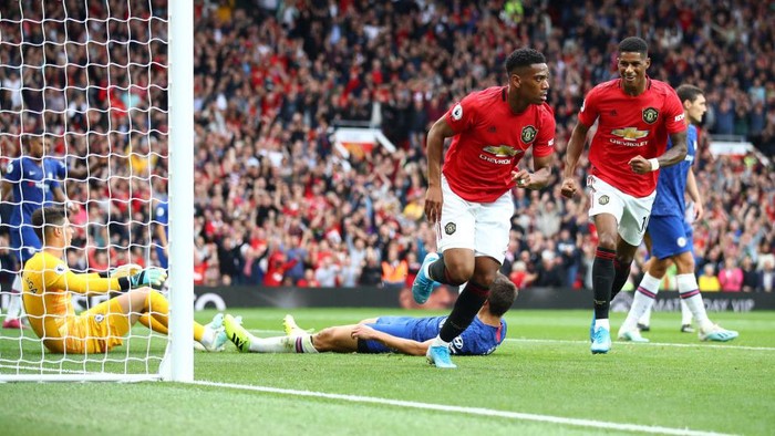 MANCHESTER, ENGLAND - AUGUST 11: Anthony Martial of Manchester United celebrates after scoring his teams second goal during the Premier League match between Manchester United and Chelsea FC at Old Trafford on August 11, 2019 in Manchester, United Kingdom. (Photo by Julian Finney/Getty Images)