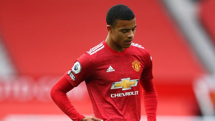 mason greenwood manchester united liga inggris MANCHESTER, ENGLAND - OCTOBER 04: Mason Greenwood of Manchester United looks on during the Premier League match between Manchester United and Tottenham Hotspur at Old Trafford on October 04, 2020 in Manchester, England. Sporting stadiums around the UK remain under strict restrictions due to the Coronavirus Pandemic as Government social distancing laws prohibit fans inside venues resulting in games being played behind closed doors. (Photo by Alex Livesey/Getty Images)